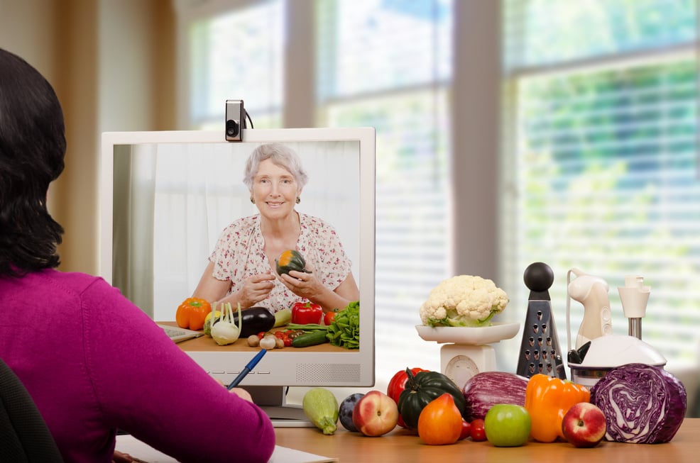 Nutrition consultant educating senior woman